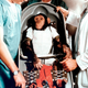 Ham the juvenile chimp with trainers at Cape Canaveral, Florida, on January 31, 1961.
